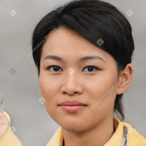 Joyful asian young-adult female with medium  brown hair and brown eyes