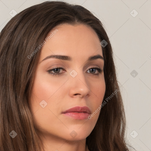 Neutral white young-adult female with long  brown hair and brown eyes