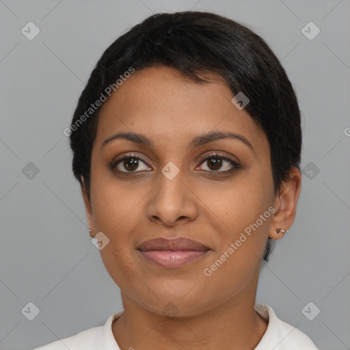 Joyful latino young-adult female with short  brown hair and brown eyes