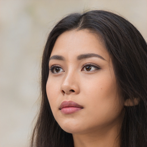 Neutral asian young-adult female with long  black hair and brown eyes