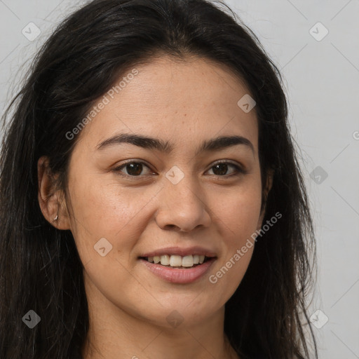 Joyful latino young-adult female with long  brown hair and brown eyes