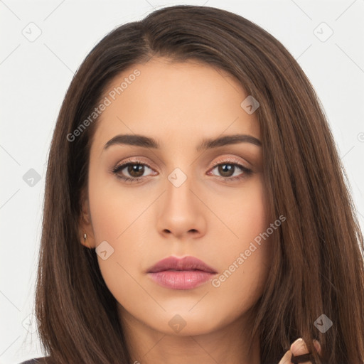 Neutral white young-adult female with long  brown hair and brown eyes