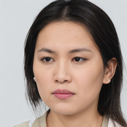 Neutral asian young-adult female with long  brown hair and brown eyes