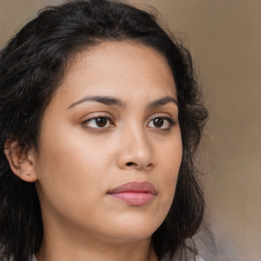 Neutral latino young-adult female with long  brown hair and brown eyes