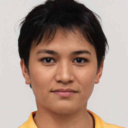 Joyful asian young-adult female with short  brown hair and brown eyes