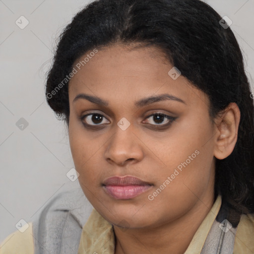 Joyful latino young-adult female with long  brown hair and brown eyes