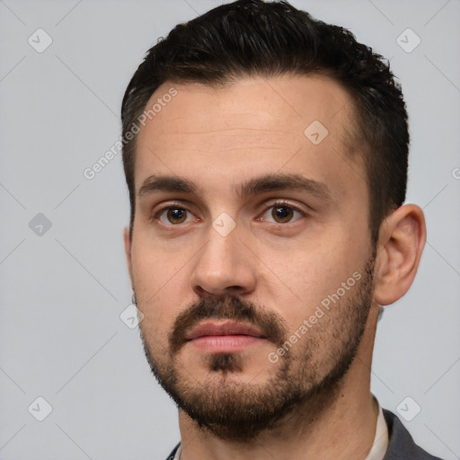 Neutral white young-adult male with short  black hair and brown eyes