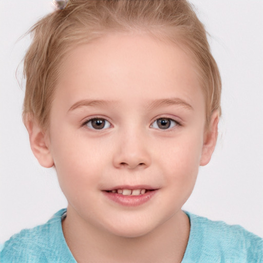 Joyful white child female with short  brown hair and grey eyes