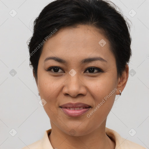 Joyful asian young-adult female with short  brown hair and brown eyes