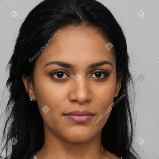 Joyful latino young-adult female with long  black hair and brown eyes