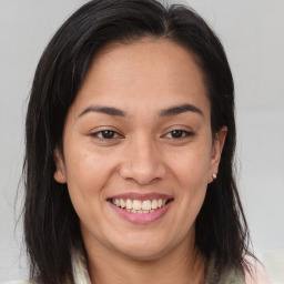 Joyful white young-adult female with medium  brown hair and brown eyes