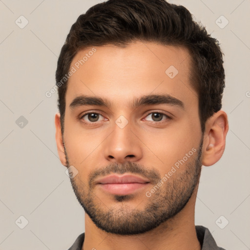 Neutral white young-adult male with short  brown hair and brown eyes