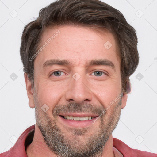 Joyful white adult male with short  brown hair and grey eyes