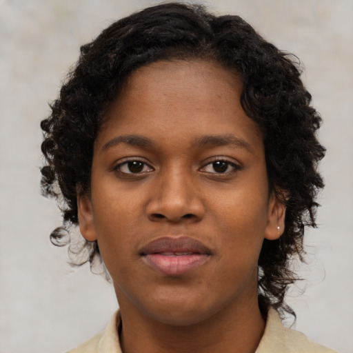 Neutral black young-adult female with short  brown hair and brown eyes