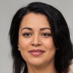 Joyful asian young-adult female with medium  black hair and brown eyes