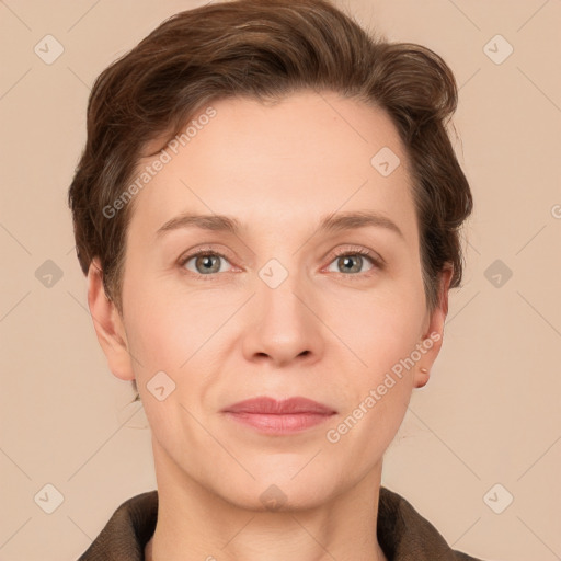 Joyful white adult female with short  brown hair and grey eyes