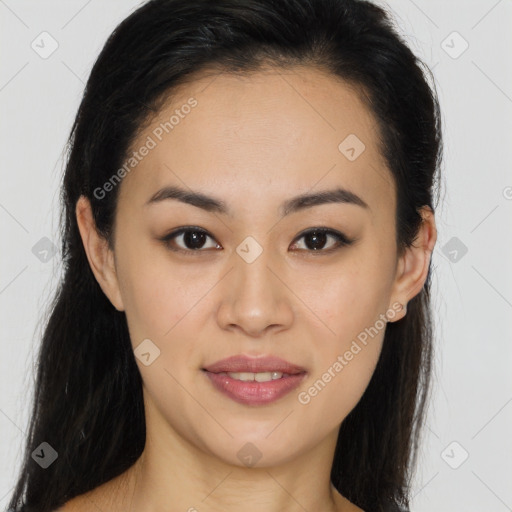 Joyful latino young-adult female with long  brown hair and brown eyes