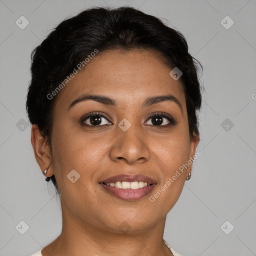 Joyful latino young-adult female with short  brown hair and brown eyes