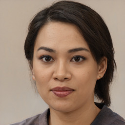 Neutral asian young-adult female with medium  black hair and brown eyes