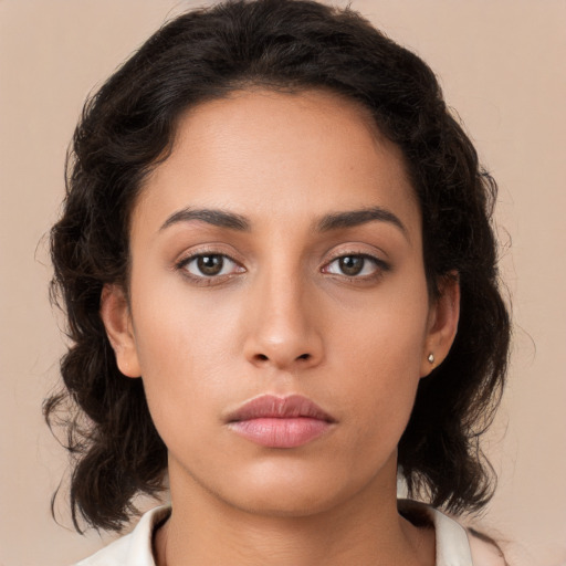 Neutral white young-adult female with medium  brown hair and brown eyes