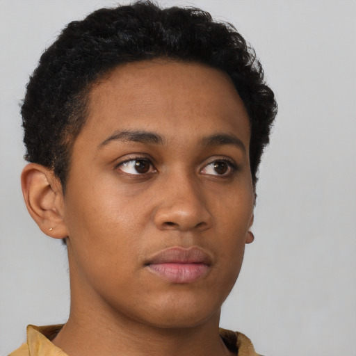 Neutral black young-adult female with short  black hair and brown eyes