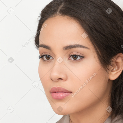 Neutral white young-adult female with long  brown hair and brown eyes