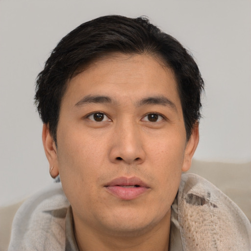 Neutral asian young-adult male with short  brown hair and brown eyes