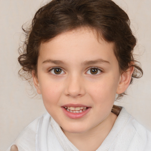 Joyful white child female with medium  brown hair and brown eyes