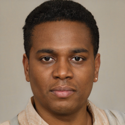 Neutral black young-adult male with short  brown hair and brown eyes