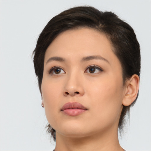Neutral asian young-adult female with medium  brown hair and brown eyes