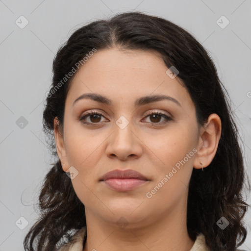 Joyful latino young-adult female with medium  brown hair and brown eyes