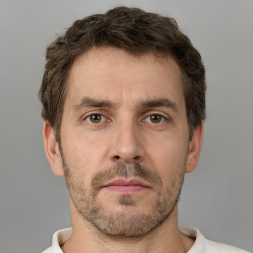 Neutral white adult male with short  brown hair and brown eyes