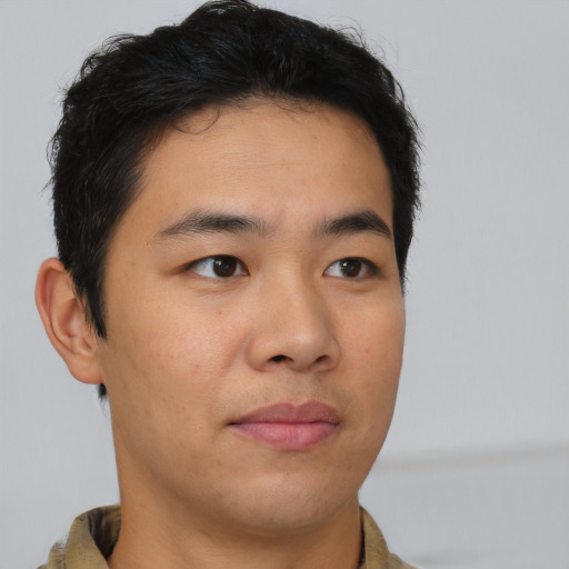 Neutral asian young-adult male with short  brown hair and brown eyes