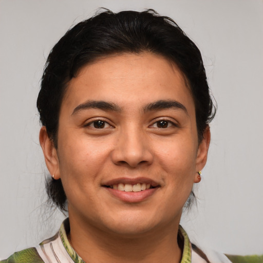 Joyful white young-adult female with medium  brown hair and brown eyes