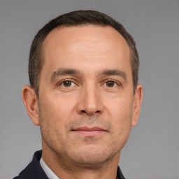 Neutral white adult male with short  brown hair and brown eyes