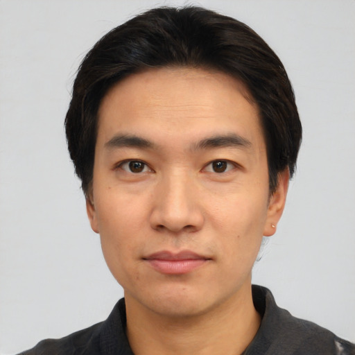 Neutral asian young-adult male with short  black hair and brown eyes