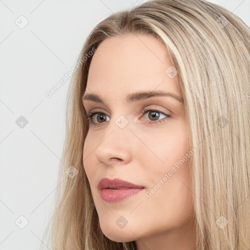 Neutral white young-adult female with long  brown hair and brown eyes