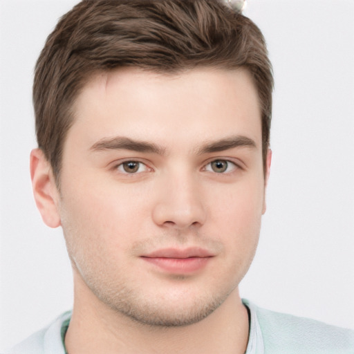 Neutral white young-adult male with short  brown hair and brown eyes