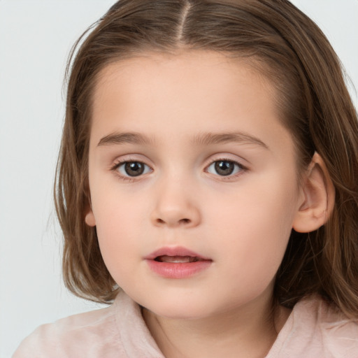 Neutral white child female with medium  brown hair and brown eyes