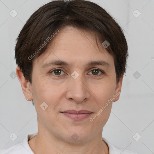 Joyful white adult female with short  brown hair and brown eyes