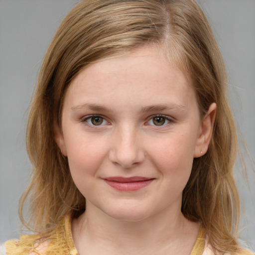 Joyful white child female with medium  brown hair and grey eyes