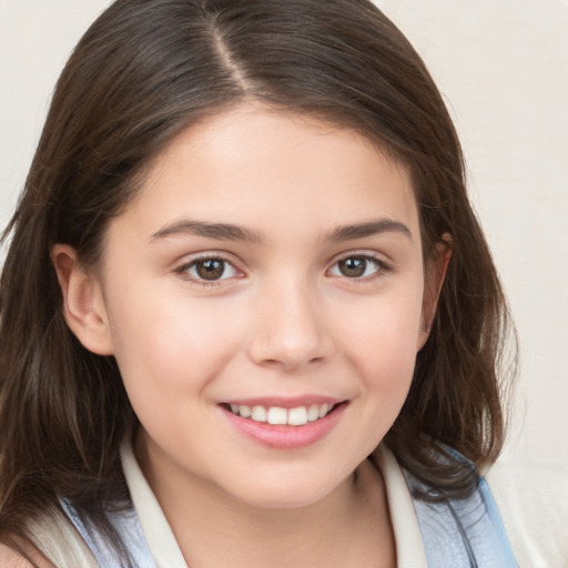 Joyful white child female with medium  brown hair and brown eyes