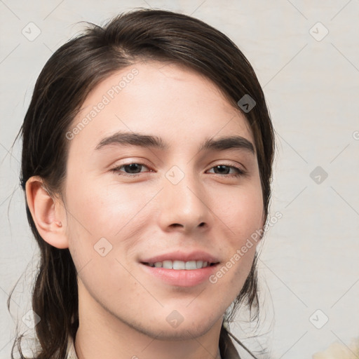 Joyful white young-adult male with medium  brown hair and brown eyes