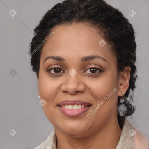 Joyful latino adult female with short  brown hair and brown eyes