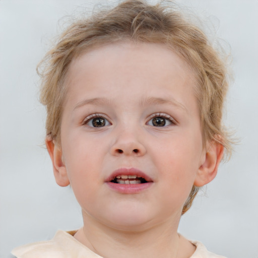 Joyful white child female with short  brown hair and brown eyes