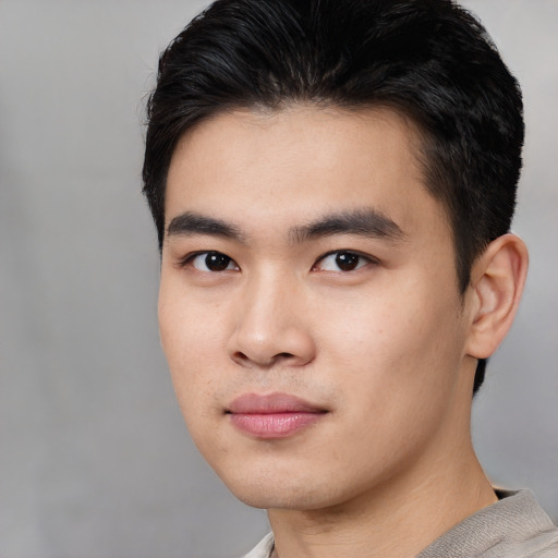 Neutral asian young-adult male with short  black hair and brown eyes