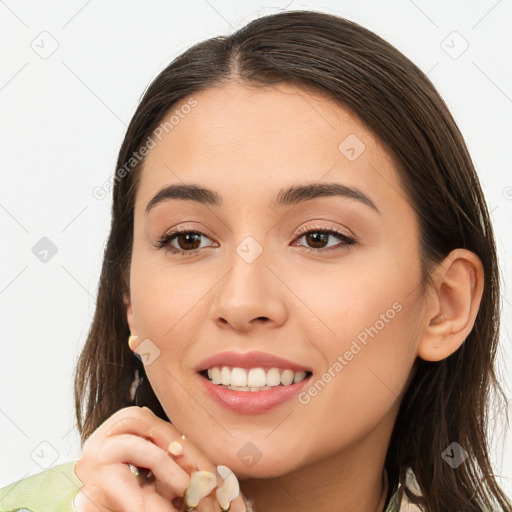 Joyful white young-adult female with long  brown hair and brown eyes