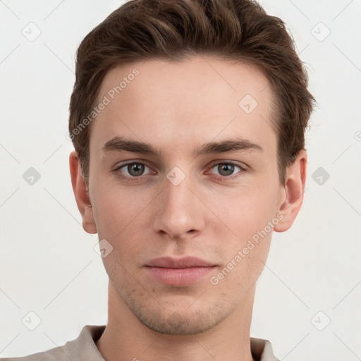 Neutral white young-adult male with short  brown hair and grey eyes