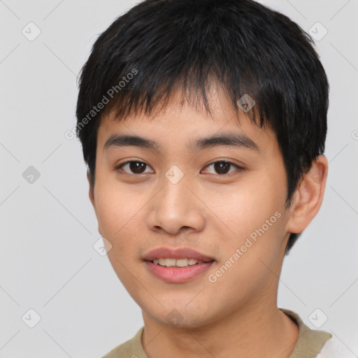 Joyful asian young-adult male with short  black hair and brown eyes