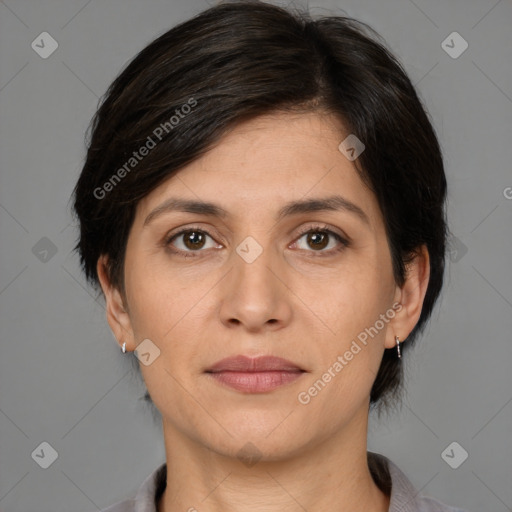 Joyful white adult female with medium  brown hair and brown eyes